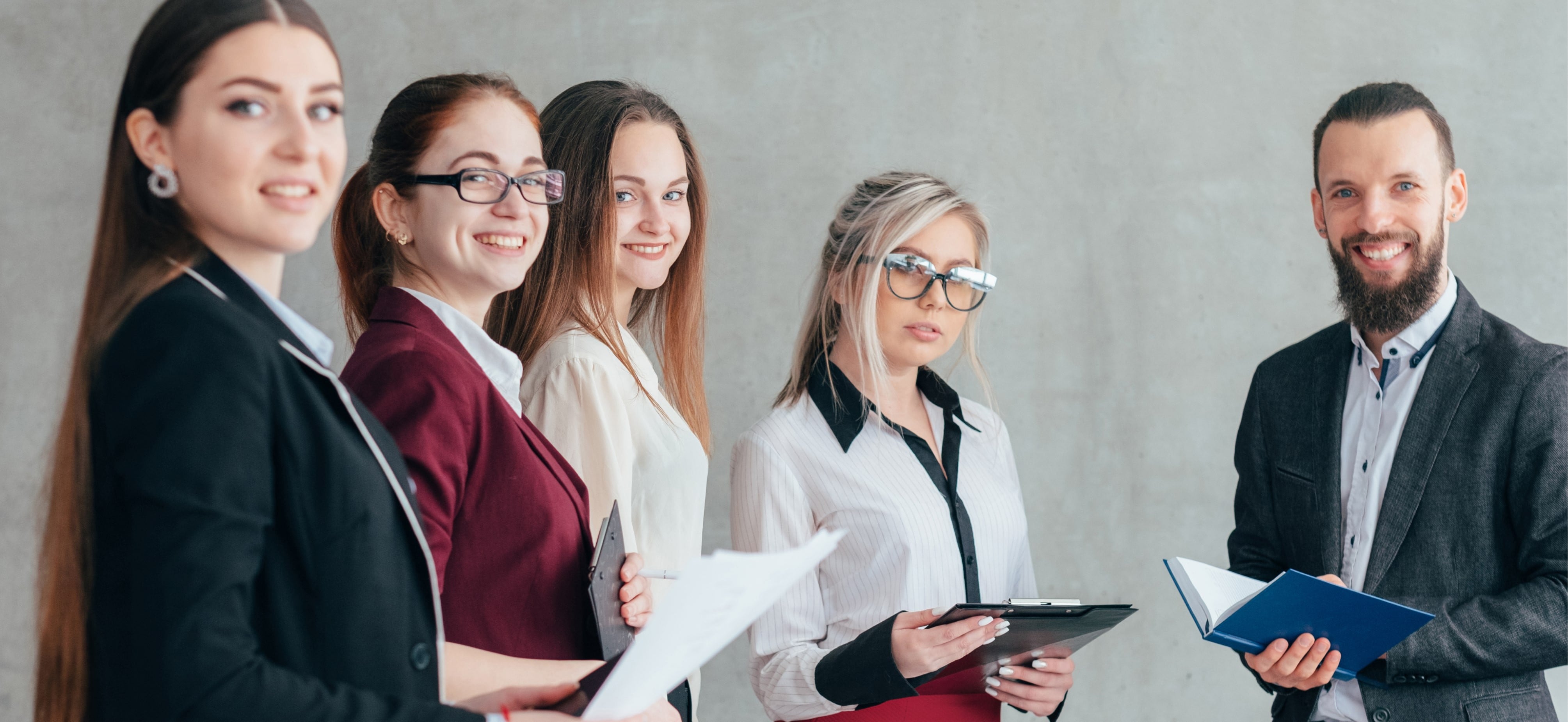 3 Professional Women who work for an IT Consulting Company.